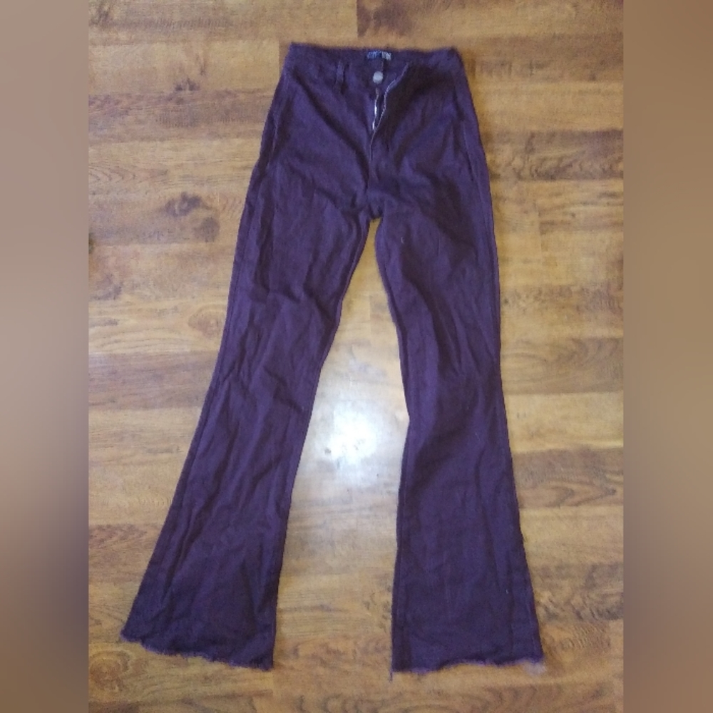 Fashion Nova Women's size 9 Burgundy flare cut with distressed hem